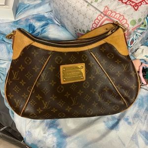 Louis Vuitton purse never carried like brand new
